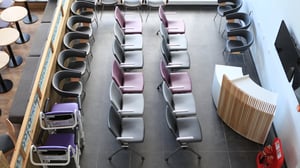 Hospital waiting area with zoned seating and a reception desk, furnished by JPA Workspaces at Chase Farm Hospital