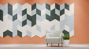 Acoustic tile wall and soft seating in an office design by JPA Workspaces